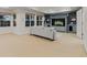 Cozy living room showcasing custom built-ins and a large window at 9368 S Silent Hills Dr, Lone Tree, CO 80124