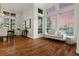 Inviting living room with hardwood floors, soft colors, and natural light at 9368 S Silent Hills Dr, Lone Tree, CO 80124