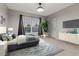 Relaxing main bedroom with ample natural light, neutral tones, and stylish furnishings at 9368 S Silent Hills Dr, Lone Tree, CO 80124