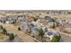The aerial shows neighborhood homes and their proximity to beautiful open space and walking trails at 448 Winterthur Cir, Highlands Ranch, CO 80129