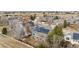 Neighborhood aerial showcasing homes with solar panels, and a beautiful open landscape perfect for outdoor activities at 448 Winterthur Cir, Highlands Ranch, CO 80129