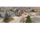 Aerial view of homes in a suburban neighborhood with mature trees and well-manicured lawns, perfect location at 448 Winterthur Cir, Highlands Ranch, CO 80129