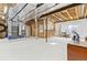 This unfinished basement offers room to build out a workshop or storage space at 448 Winterthur Cir, Highlands Ranch, CO 80129