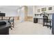 This home office features plush carpet and multiple spaces to work from at 448 Winterthur Cir, Highlands Ranch, CO 80129