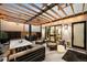 Stylish backyard patio with wooden pergola, comfortable seating, and outdoor kitchen perfect for entertaining and relaxation at 340 Milwaukee St, Denver, CO 80206