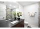 Modern bathroom with stone tile shower, sleek vanity, and elegant fixtures, offering a spa-like experience with contemporary design at 340 Milwaukee St, Denver, CO 80206