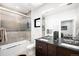 Contemporary bathroom featuring stylish shower and dual sink vanity at 340 Milwaukee St, Denver, CO 80206