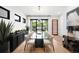 Elegant dining room with modern table, chairs, and natural light at 340 Milwaukee St, Denver, CO 80206