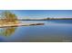 Scenic lake view with a dock, offering peaceful waterfront access at 1371-1373 Wolff St, Denver, CO 80204
