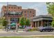 View of Odell Brewing patio area with outdoor seating and adjacent shops at 1371-1373 Wolff St, Denver, CO 80204