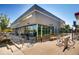 Modern restaurant with outdoor seating and a bicycle rack at 1371-1373 Wolff St, Denver, CO 80204