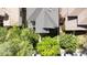 Aerial view of a home featuring a well-maintained gray roof, lush landscaping, and driveway at 1317 S Saint Paul St, Denver, CO 80210