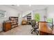 Bright office space with built-in bookshelves, desk area, and plenty of natural light at 1317 S Saint Paul St, Denver, CO 80210