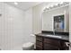 Modern bathroom features a stand up shower, vanity and updated fixtures at 3943 W 12Th Ave, Denver, CO 80204