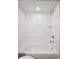 Clean bathroom with a white bathtub and shower at 3943 W 12Th Ave, Denver, CO 80204