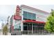 An exterior view showcasing Alamo Draft House with modern architecture and a bright, inviting atmosphere at 3943 W 12Th Ave, Denver, CO 80204