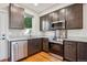Well-equipped kitchen featuring stainless steel appliances and stone countertops at 3943 W 12Th Ave, Denver, CO 80204