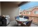 Balcony with outdoor seating, a grill, and an amazing neighborhood view at 9165 Kornbrust Dr, Lone Tree, CO 80124