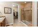 Bathroom with a walk-in closet, shower, and tile flooring at 9165 Kornbrust Dr, Lone Tree, CO 80124
