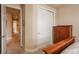 Bedroom showcasing closet, corner walls and hallway access adjacent to wooden bed frame at 9165 Kornbrust Dr, Lone Tree, CO 80124