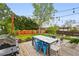 Back yard deck features outdoor table, seating, and grill for entertaining at 2626 Tennyson St, Denver, CO 80212