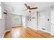 Bright bedroom featuring wood floors, neutral paint, and large closet at 2626 Tennyson St, Denver, CO 80212