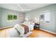 Bright bedroom with hardwood floors, a ceiling fan, and lots of natural light at 2626 Tennyson St, Denver, CO 80212