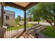 View from the front porch showcasing the neighborhood with iron railings at 2626 Tennyson St, Denver, CO 80212