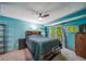Bedroom with a large window and closet at 12565 Eudora St, Thornton, CO 80241