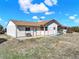 View of the house exterior showing the back entrance with handicap ramp at 40154 E Colorado Ave, Bennett, CO 80102