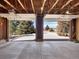 Two-car garage with two garage doors and concrete floor at 40154 E Colorado Ave, Bennett, CO 80102
