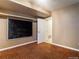 Unfinished basement showcasing patterned flooring, ready to be customized to your liking at 1050 S Monaco Pkwy # 126, Denver, CO 80224