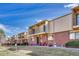 Attractive townhome complex with brick exteriors, balconies, and well-manicured lawns at 750 Tabor St # 46, Lakewood, CO 80401