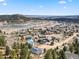 Sprawling community with scenic lake views, lush trees, and single Gathering homes at 508 Viola St, Palmer Lake, CO 80133