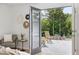 A view of the outdoor deck and backyard, accessible from the main bedroom through French doors at 2675 S Eudora St, Denver, CO 80222