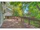 View from the back deck showing the wooden railing and stairs leading to the yard below at 3966 Bosque Ct, Boulder, CO 80301