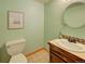 Cozy powder room with neutral tones and tiled floor at 3966 Bosque Ct, Boulder, CO 80301