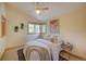 Inviting bedroom with a large window, comfortable bed, and neutral decor at 3966 Bosque Ct, Boulder, CO 80301
