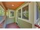 Covered deck with wood floors offers an outdoor space at 3966 Bosque Ct, Boulder, CO 80301