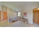 Upstairs hallway features a decorative railing and natural light at 3966 Bosque Ct, Boulder, CO 80301