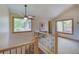 Upstairs landing with large windows providing ample natural light at 3966 Bosque Ct, Boulder, CO 80301