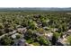 Scenic aerial view of a residential area featuring well-maintained homes and mature trees at 6470 Field St, Arvada, CO 80004