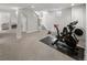 Finished basement featuring workout area and living room space at 6470 Field St, Arvada, CO 80004