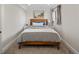 A cozy bedroom features natural light and calm decor for relaxation at 6470 Field St, Arvada, CO 80004