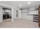 Large basement featuring a laundry area and open space for flexible use at 2165 S Flower St, Lakewood, CO 80227