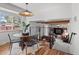 Cozy dining area with modern lighting and decor and hardwood floors at 2165 S Flower St, Lakewood, CO 80227