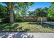 Charming home with lush landscaping, mature trees, and well-maintained lawn at 6780 Allison St, Arvada, CO 80004