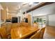 Open kitchen and living area with granite countertops and stainless steel appliances at 6780 Allison St, Arvada, CO 80004
