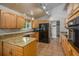 Kitchen with granite countertops, stainless steel appliances, and ample cabinet space at 6780 Allison St, Arvada, CO 80004