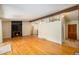 Large living room with hardwood floors, fireplace, and ample space for entertaining at 6780 Allison St, Arvada, CO 80004